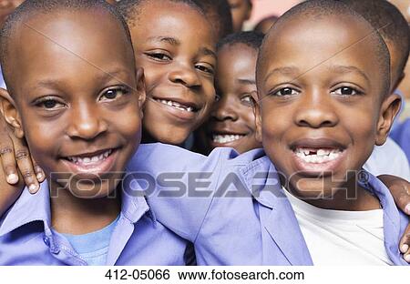 Students smiling together View Large Photo Image Stock Photograph - Students smiling together. Fotosearch