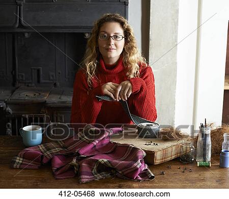 Woman with upholstery webbing and cloth View Large Photo Image Stock Photo - Woman with upholstery webbing and cloth. Fotosearch
