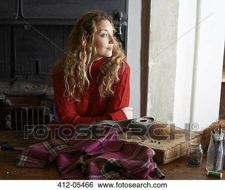Woman with upholstery webbing and cloth View Large Photo Image Stock Photograph - Woman with upholstery webbing and cloth. Fotosearch