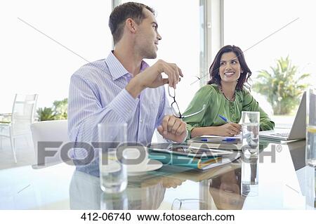 Business people talking in meeting View Large Photo Image Stock Image - Business people talking in meeting. Fotosearch