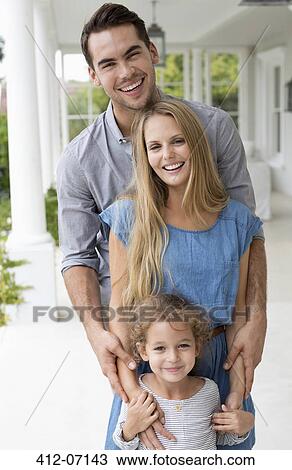 Family smiling together on porch View Large Photo Image Stock Image - Family smiling together on porch. Fotosearch