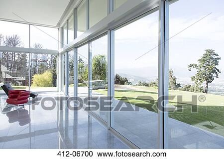 Modern building overlooking manicured lawn View Large Photo Image Stock Image - Modern building overlooking manicured lawn. Fotosearch