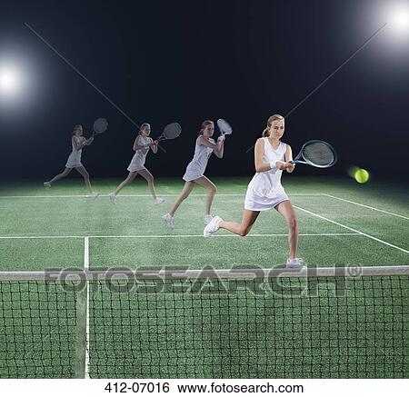 Multiple exposure of tennis player hitting ball on court View Large Photo Image Stock Photograph - Multiple exposure of tennis player hitting ball on court. Fotosearch