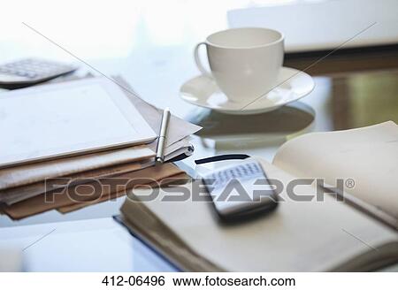 Notebook, cell phone and cup of coffee on desk View Large Photo Image Stock Photograph - Notebook, cell phone and cup of coffee on desk. Fotosearch