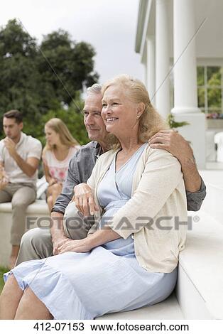 Older couple sitting on porch View Large Photo Image Stock Image - Older couple sitting on porch. Fotosearch