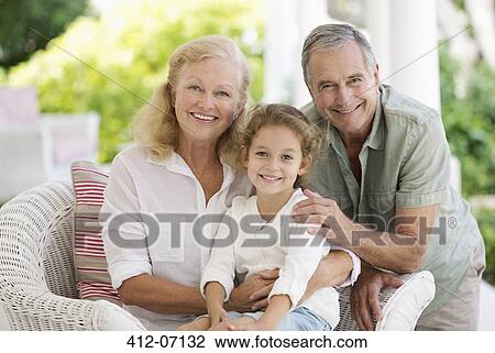 Older couple with granddaughter on porch View Large Photo Image Stock Image - Older couple with granddaughter on porch. Fotosearch