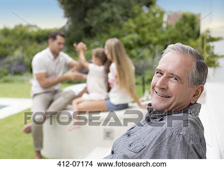 Older man smiling outdoors View Large Photo Image Picture - Older man smiling outdoors. Fotosearch