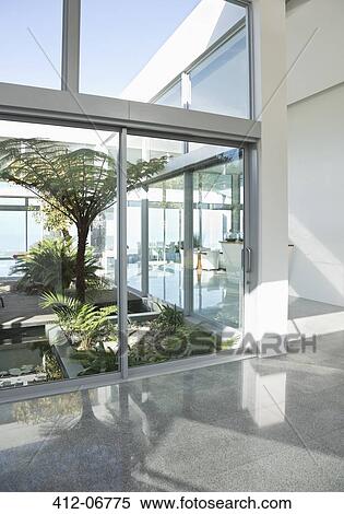 Plants in modern courtyard View Large Photo Image Stock Photography - Plants in modern courtyard. Fotosearch