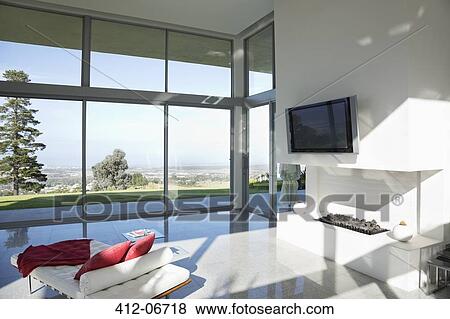 Sofa, television and fireplace in modern living room View Large Photo Image Stock Photo - Sofa, television and fireplace in modern living room. Fotosearch