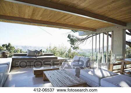 Sofas and tables on modern porch View Large Photo Image Stock Photo - Sofas and tables on modern porch. Fotosearch