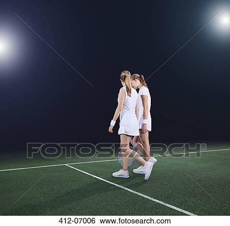 Tennis players walking on court View Large Photo Image Stock Photograph - Tennis players walking on court. Fotosearch