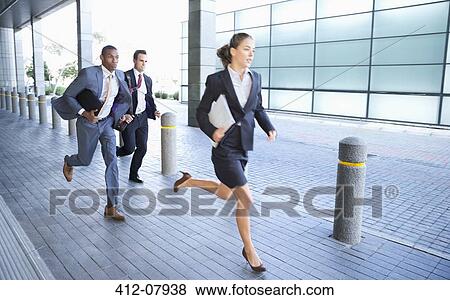 Business people running View Large Photo Image Stock Photo - Business people running. Fotosearch