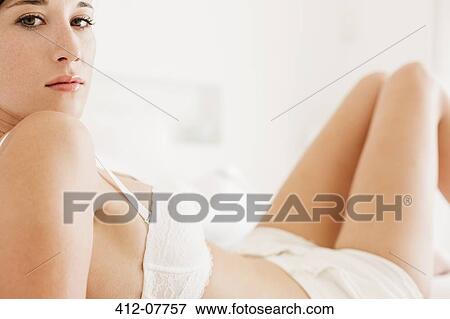 Close up portrait of serious woman in bra and underwear View Large Photo Image Stock Photo - Close up portrait of serious woman in bra and underwear. Fotosearch