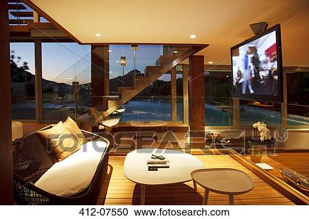 Flat screen TV in modern living room View Large Photo Image Stock Image - Flat screen TV in modern living room. Fotosearch