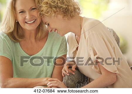 Laughing mother and daughter View Large Photo Image Picture - Laughing mother and daughter. Fotosearch