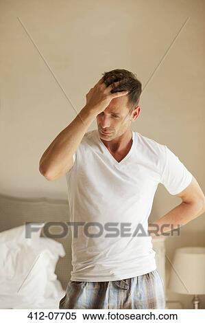 Man holding head and back in pain View Large Photo Image Stock Photography - Man holding head and back in pain. Fotosearch