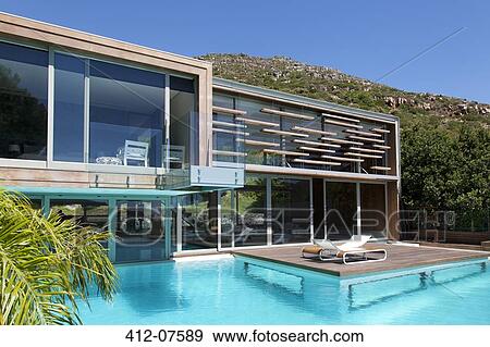 Modern house with swimming pool Stock Photo  412-07589  Fotosearch