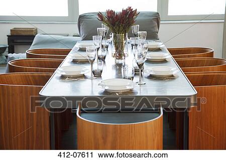 Place settings on table in luxury dining room View Large Photo Image Stock Image - Place settings on table in luxury dining room. Fotosearch