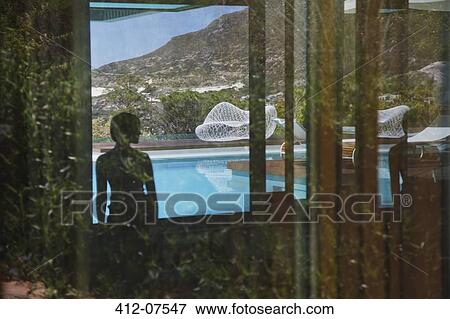 Shadow of woman looking at swimming pool View Large Photo Image Stock Photo - Shadow of woman looking at swimming pool. Fotosearch