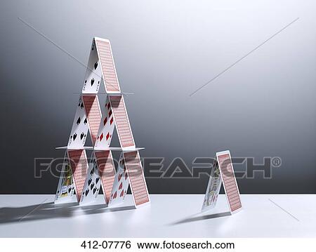 Small house of cards next to large house of cards View Large Photo Image Stock Photograph - Small house of cards next to large house of cards. Fotosearch