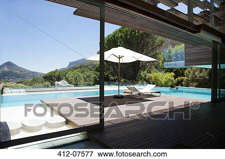 Swimming pool with mountain view View Large Photo Image Stock Photo - Swimming pool with mountain view. Fotosearch