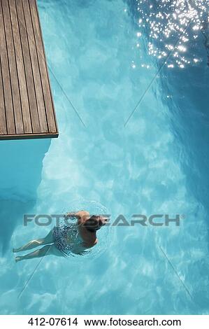 Woman in swimming pool View Large Photo Image Picture - Woman in swimming pool. Fotosearch