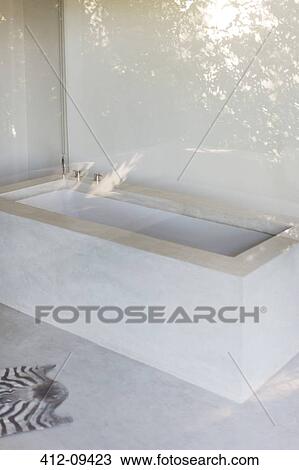 Bathtub in modern bathroom View Large Photo Image Stock Image - Bathtub in modern bathroom. Fotosearch
