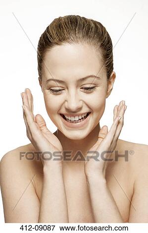 Stock Photo - Close up of woman laughing. Fotosearch