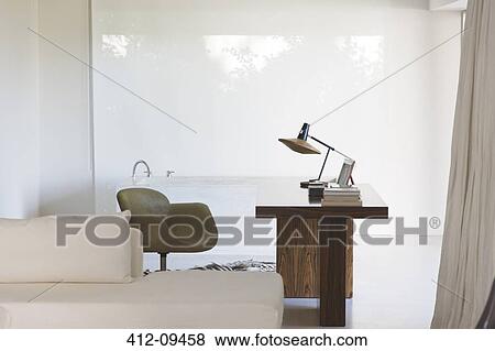 Desk and bathtub in modern home View Large Photo Image Stock Photo - Desk and bathtub in modern home. Fotosearch
