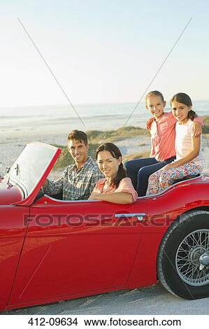Family in convertible on beach View Large Photo Image Picture - Family in convertible on beach. Fotosearch