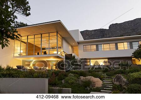 Landscaping in front of modern house View Large Photo Image Stock Photo - Landscaping in front of modern house. Fotosearch