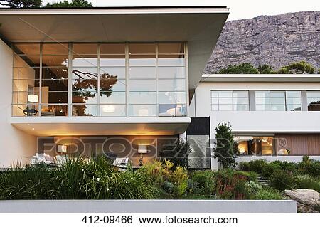 Landscaping in front of modern house View Large Photo Image Stock Photograph - Landscaping in front of modern house. Fotosearch
