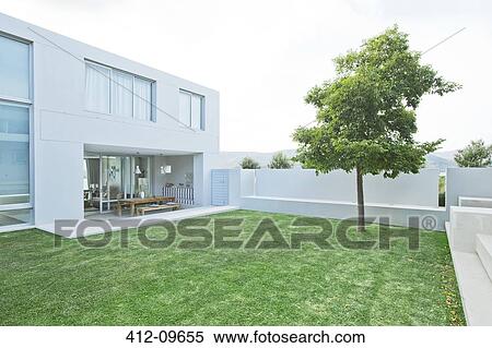 Lawn outside modern house View Large Photo Image Stock Photography - Lawn outside modern house. Fotosearch