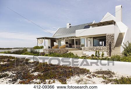Modern house on beach View Large Photo Image Stock Photograph - Modern house on beach. Fotosearch