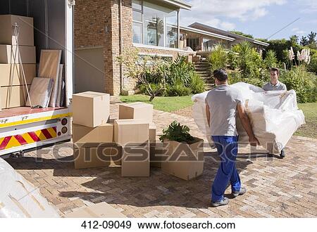 Stock Photo - Movers carrying sofa from moving van to house. Fotosearch