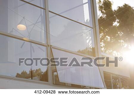 Stock Photo - Open window of modern house. Fotosearch
