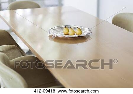Pears in glass dish on dining table View Large Photo Image Stock Photo - Pears in glass dish on dining table. Fotosearch