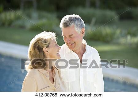 Senior couple at poolside View Large Photo Image Stock Photography - Senior couple at poolside. Fotosearch