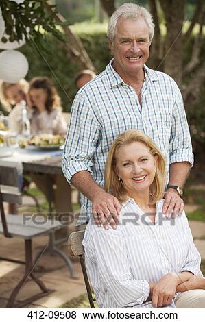 Stock Photo - Senior couple smiling outdoors. Fotosearch