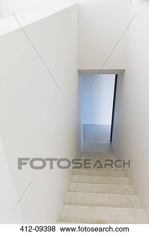 Stock Photo - Staircase and doorway of modern house. Fotosearch