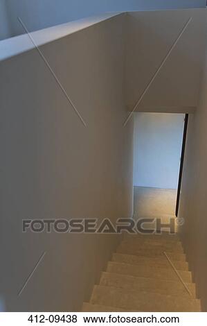 Stock Photo - Staircase and doorway of modern house. Fotosearch