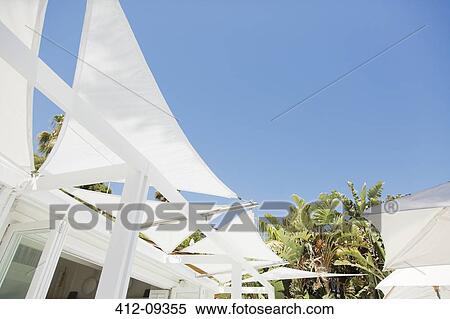 White awnings against blue sky View Large Photo Image Stock Photography - White awnings against blue sky. Fotosearch