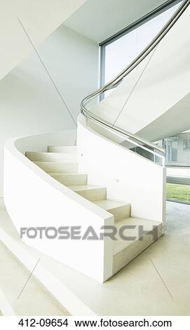 Winding staircase in modern house View Large Photo Image Picture - Winding staircase in modern house. Fotosearch