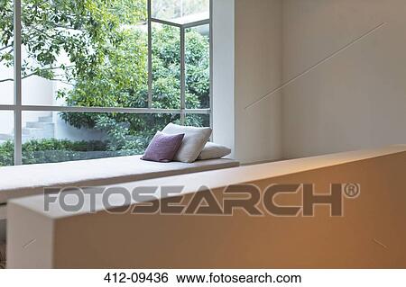Window seat overlooking courtyard View Large Photo Image Stock Photograph - Window seat overlooking courtyard. Fotosearch