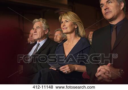 Attentive theater audience View Large Photo Image Stock Photo - Attentive theater audience. Fotosearch
