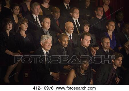Attentive theater audience View Large Photo Image Stock Photograph - Attentive theater audience. Fotosearch