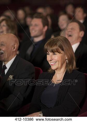 Audience laughing in theater View Large Photo Image Stock Photograph - Audience laughing in theater. Fotosearch