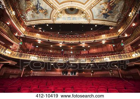 Balcony, seats and ornate ceiling in theater auditorium View Large Photo Image Stock Photo - Balcony, seats and ornate ceiling in theater auditorium. Fotosearch
