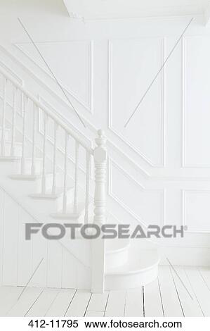 Banister and staircase in white foyer View Large Photo Image Stock Photography - Banister and staircase in white foyer. Fotosearch