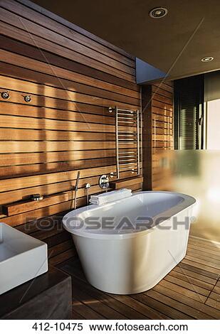 Bathtub and sink in modern bathroom View Large Photo Image Stock Photography - Bathtub and sink in modern bathroom. Fotosearch